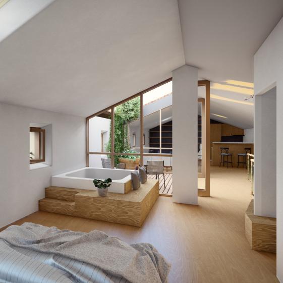 Vue intérieure de la chambre sous rampant avec sa tropézienne