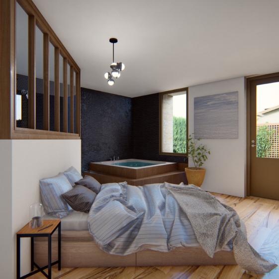 Vue intérieure d'une chambre avec son spa et sa terrasse en fond