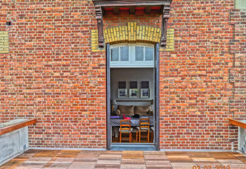 Accès à la nouvelle terrasse accessible depuis le séjour de l'appartement du 1er