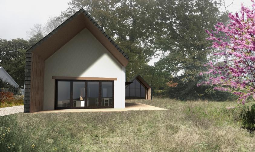 La toiture s’avance pour offrir une protection solaire, notamment à l’Ouest, afi