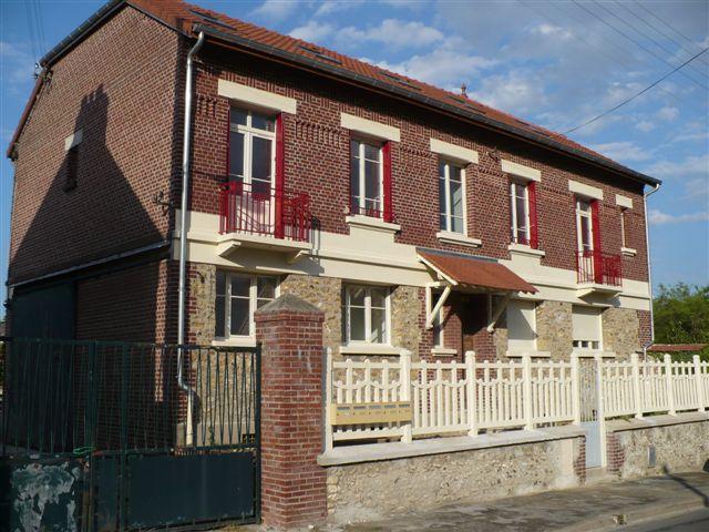 Maison individuelle divisée en 4 appartements
