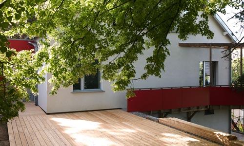 Réhabilitation et extension écologique d'une maison des années 50, façade nord