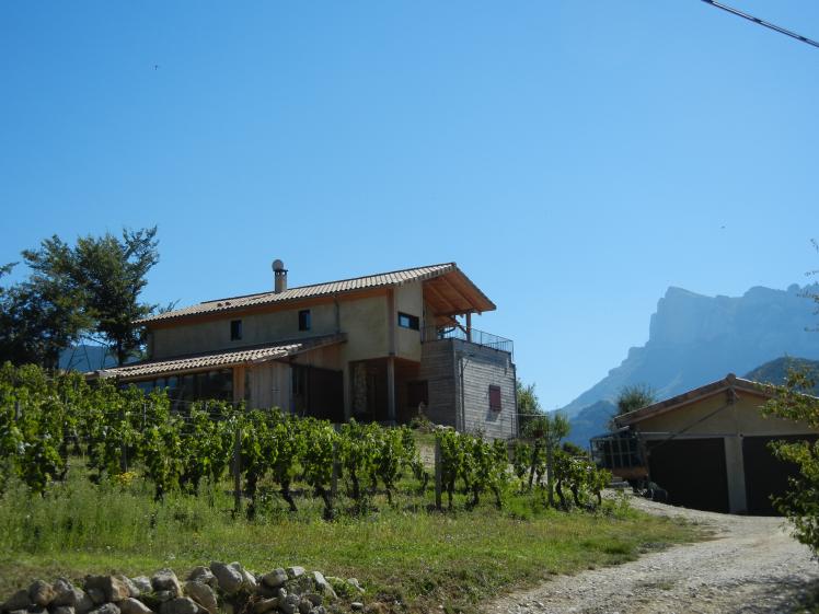 Maison écologique, bottes de paille, serre bioclimatique, voûtes d'arêtes en bri