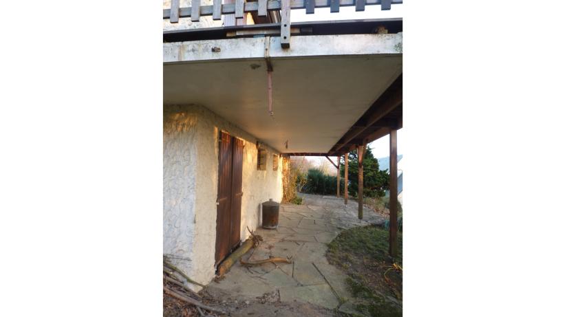 Façade Sud sous terrasse avant travaux