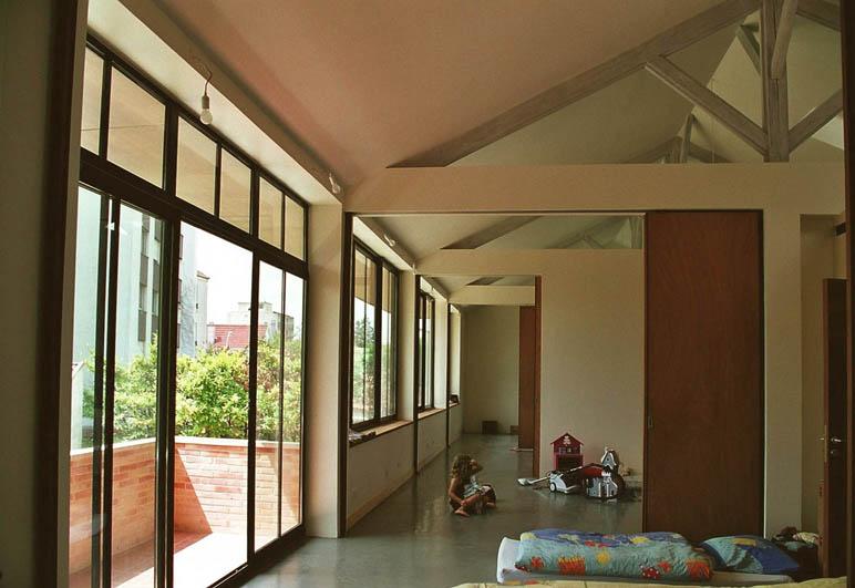 Loft dans un ancien entrepôt - Chambes et salles de jeu à l'étage