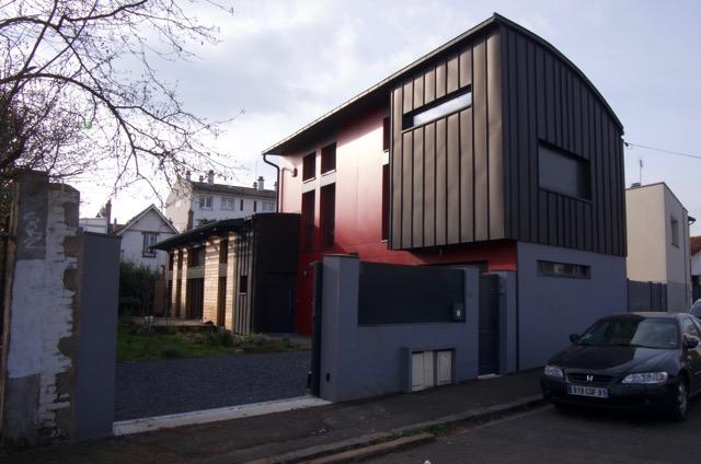 façade sud et pignon sur rue en zinc noir