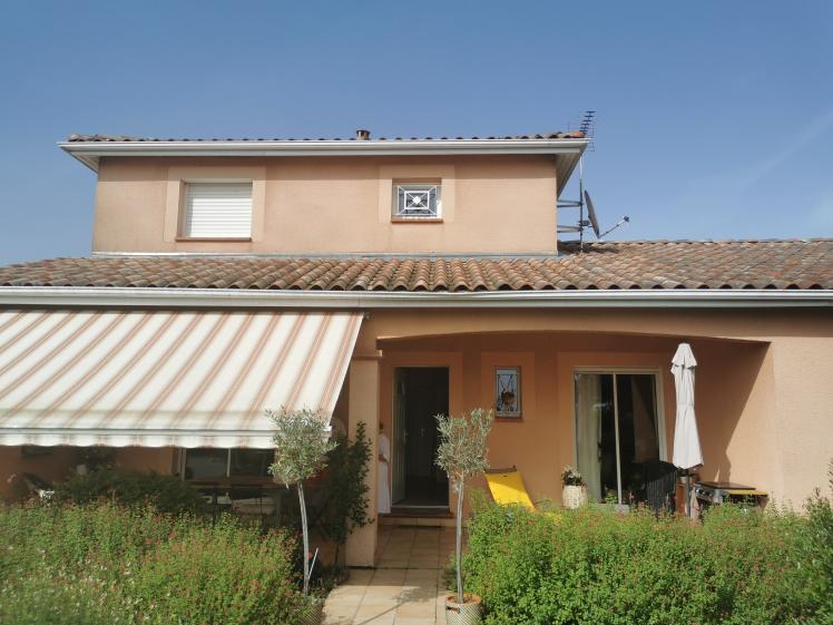 Rénovation, extension d'une maison et construction d'une cuisine d'été.