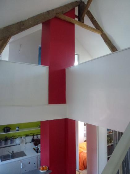 La colonne structurant la double hauteur