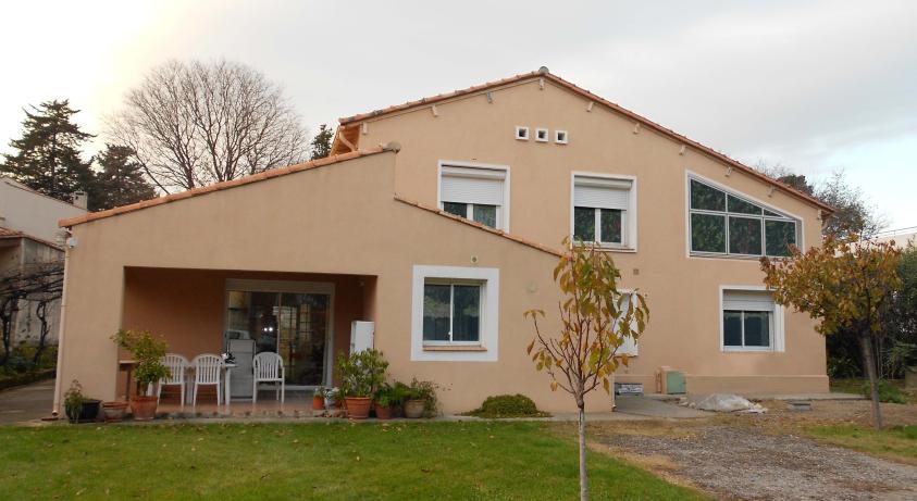 Agrandissement et rénovation d'un appartement. Aménagement de combles.
