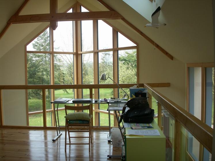 La mezzanine bureau se projette dans les arbres