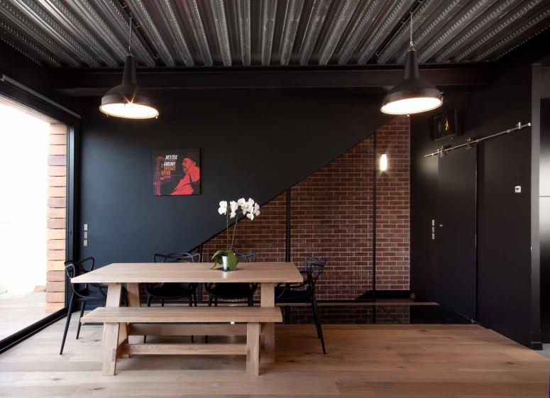 Maison de style industriel - grille et bacs acier 