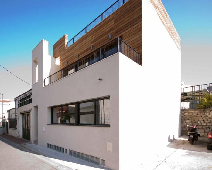 Maison de style industriel - bardage bois