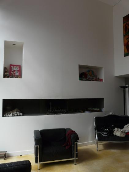 Traitement d'une cheminée dans l'épaisseur du mur