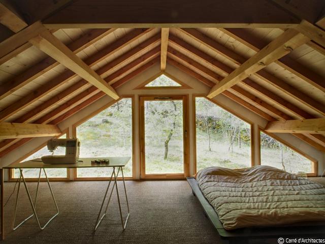 09_maison_bois_luzech_mezzanine_cote_jardin.jpg