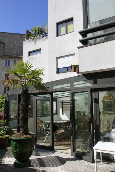 Salon d'été et terrasse en extension