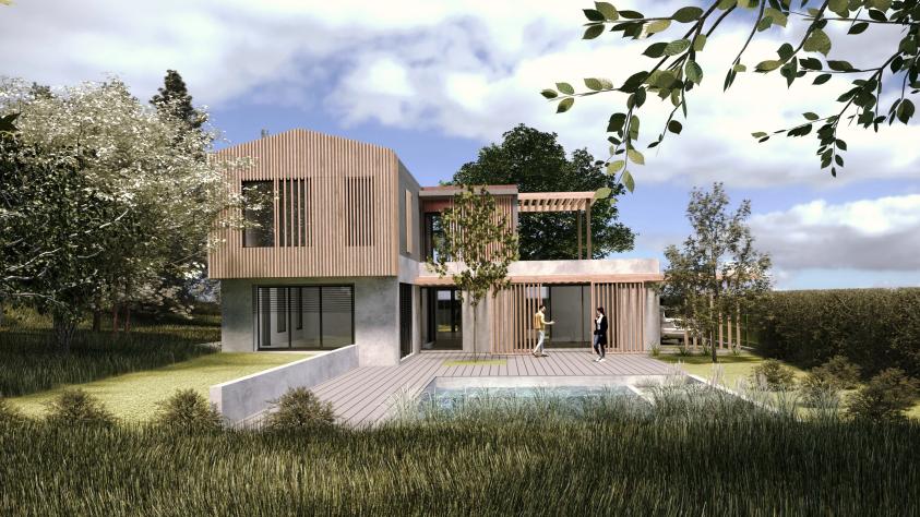 Construction d'une maison sur un terrain végétalisé avec piscine naturelle