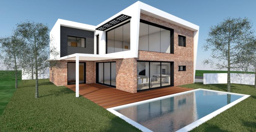 Construction d'une maison contemporaine par l'atelier S , architecte basé à Toulouse : vue de la façade principale avec la piscine au premier plan
