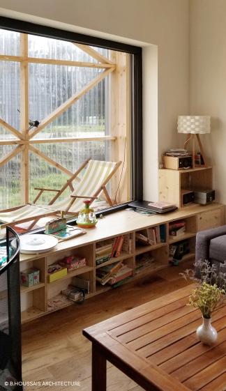 Maison ossature bois & jardin d'hiver : le jardin d'hiver comme une extension de la pièce à vivre