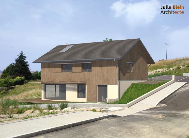 la maison s'intègre dans son terrain en pente