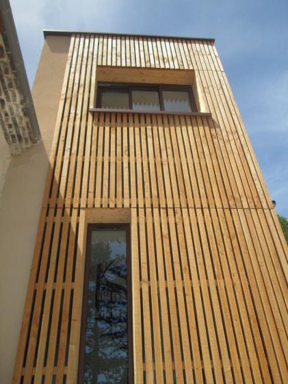 Bardage tasseaux bois