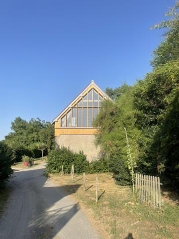 grange transformée en maison - pignon vitrée