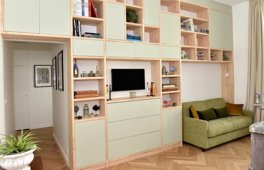 Espace bureau Bibliothèque sur mesure, porte coulissante intégrée