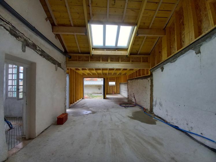 Photo de chantier Vue intérieure, juxtaposition de systèmes constructifs, ossature bois