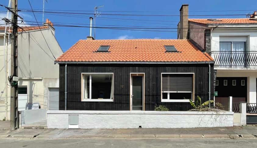 Façade après travaux Façade du projet, rénovation thermique d'une maison individuelle