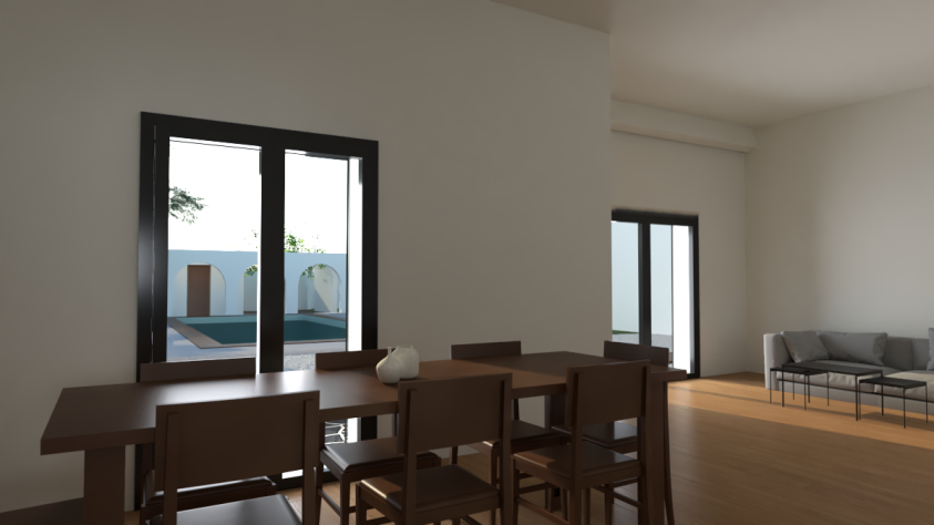 Vue de la salle à manger avec le salon en second plan.