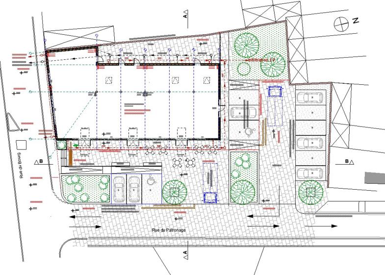 Construction d'un bâtiment à usage commercial : Structure et murs ossature bois - Bardage Equitone - Toiture végétalisée - Toiture métallique joint debout - Menuiseries Aluminium - Panneaux photovoltaïque