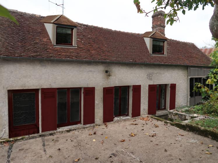 Façade sur jardin de la maison, avec création lucarnes et atelier. 
