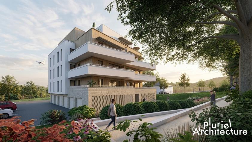 Vue perspective d’un plot de logements collectifs contemporains à Forbach, avec rampe d'accès PMR