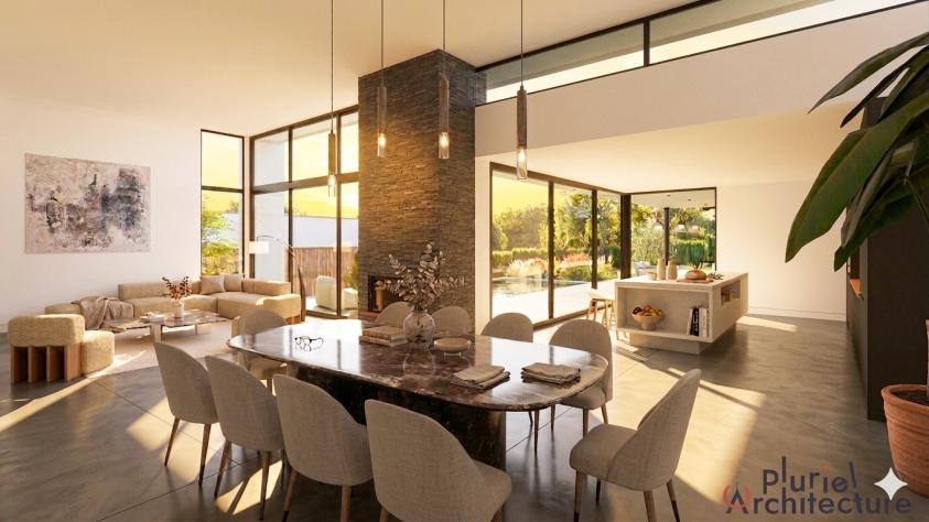 Vue intérieure depuis la salle à manger avec grandes ouvertures donnant sur la terrasse et la piscine