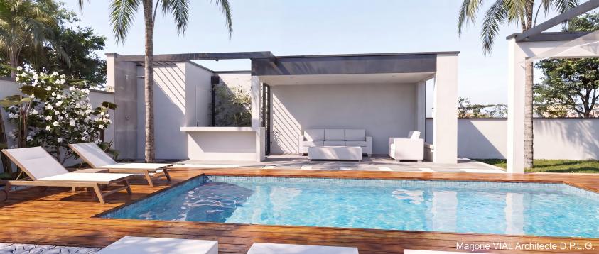 Vue sur la poolhouse poolhouse avec coin salon, coin bar, local technique et douche extérieure