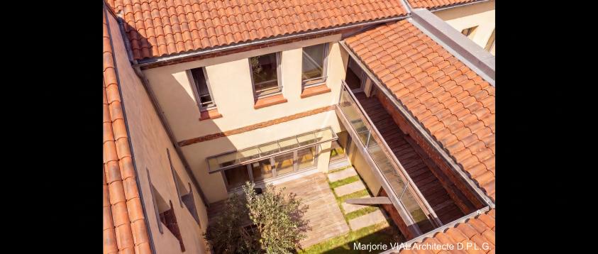 Création de patios avec passerelles de jonction