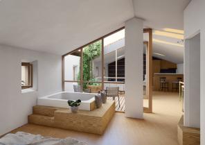 Vue intérieure de la chambre sous rampant avec sa tropézienne