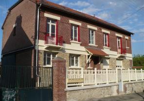 Maison individuelle divisée en 4 appartements
