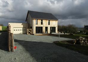 Accès, façade Sud-Ouest & garage (parpaing enduit)