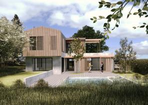 Construction d'une maison sur un terrain végétalisé avec piscine naturelle