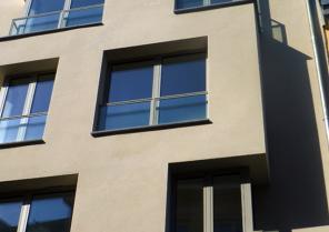 construction immeuble de 6 logements - Murs en maçonnerie + enduit de façade et/ou habillage panneaux en pierre bleue - Planchers béton - Menuiseries Alu - ascenseur pour voitures 
