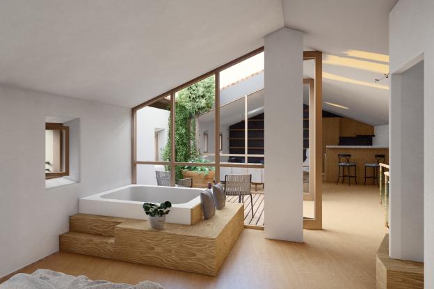 Vue intérieure de la chambre sous rampant avec sa tropézienne