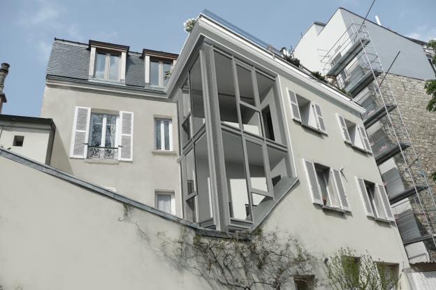 MAISON SUR LE TOIT