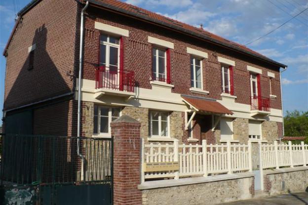 Maison individuelle divisée en 4 appartements