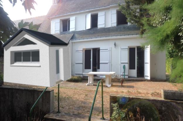 Avant corps sur jardin ouvrant sur la terrasse sud.