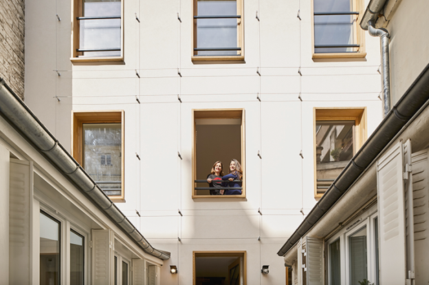 Transformation d'un petit immeuble en troplex unifamilial