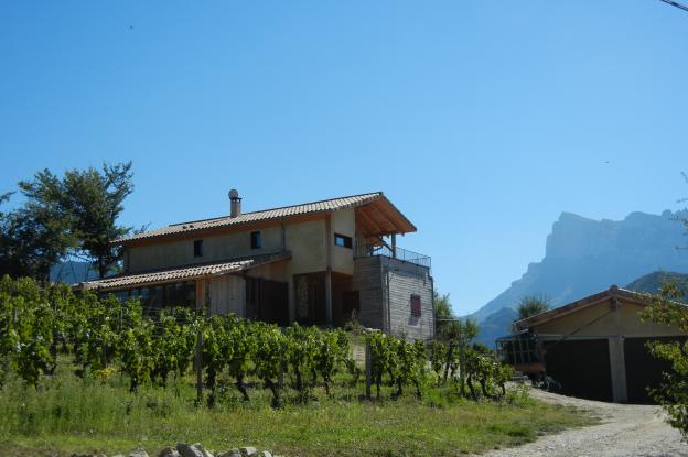 Maison écologique, bottes de paille, serre bioclimatique, voûtes d'arêtes en bri