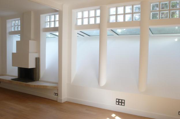 Tout le mur de façade su Salon a été repris par des poteaux.