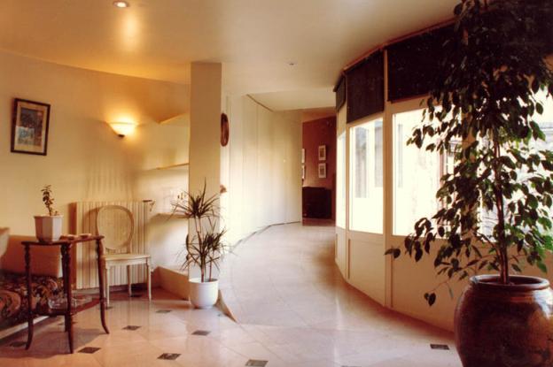 Maison Ruben - galerie courbe de liaison entre l'existant et l'extension