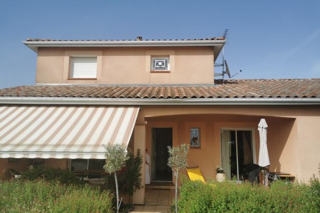 Rénovation, extension d'une maison et construction d'une cuisine d'été.