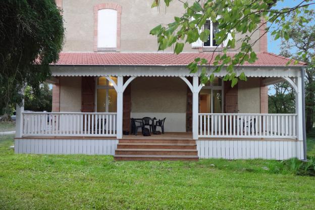 Une grande terrasse ouverte sur le jardin, "esprit Louisiane", tel était le souh